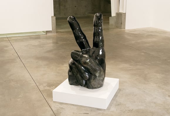 Elizabeth Zvonar, <em>Sign of the Times</em> 2006. Serpentine stone. 20″ × 23″ × 42″. Courtesy the artist and Daniel Faria Gallery